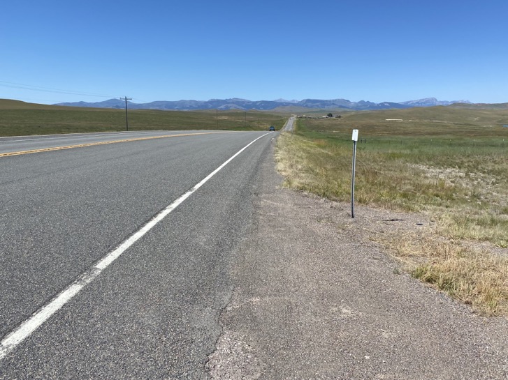 Rocky Mountains in the distance.