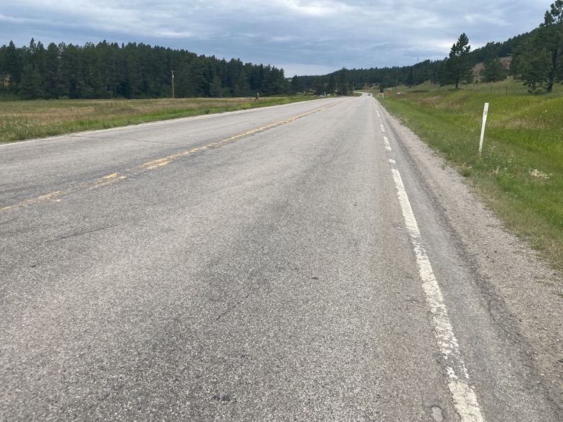 I prefer hill over wind any day. This highway could've used a wider shoudler.